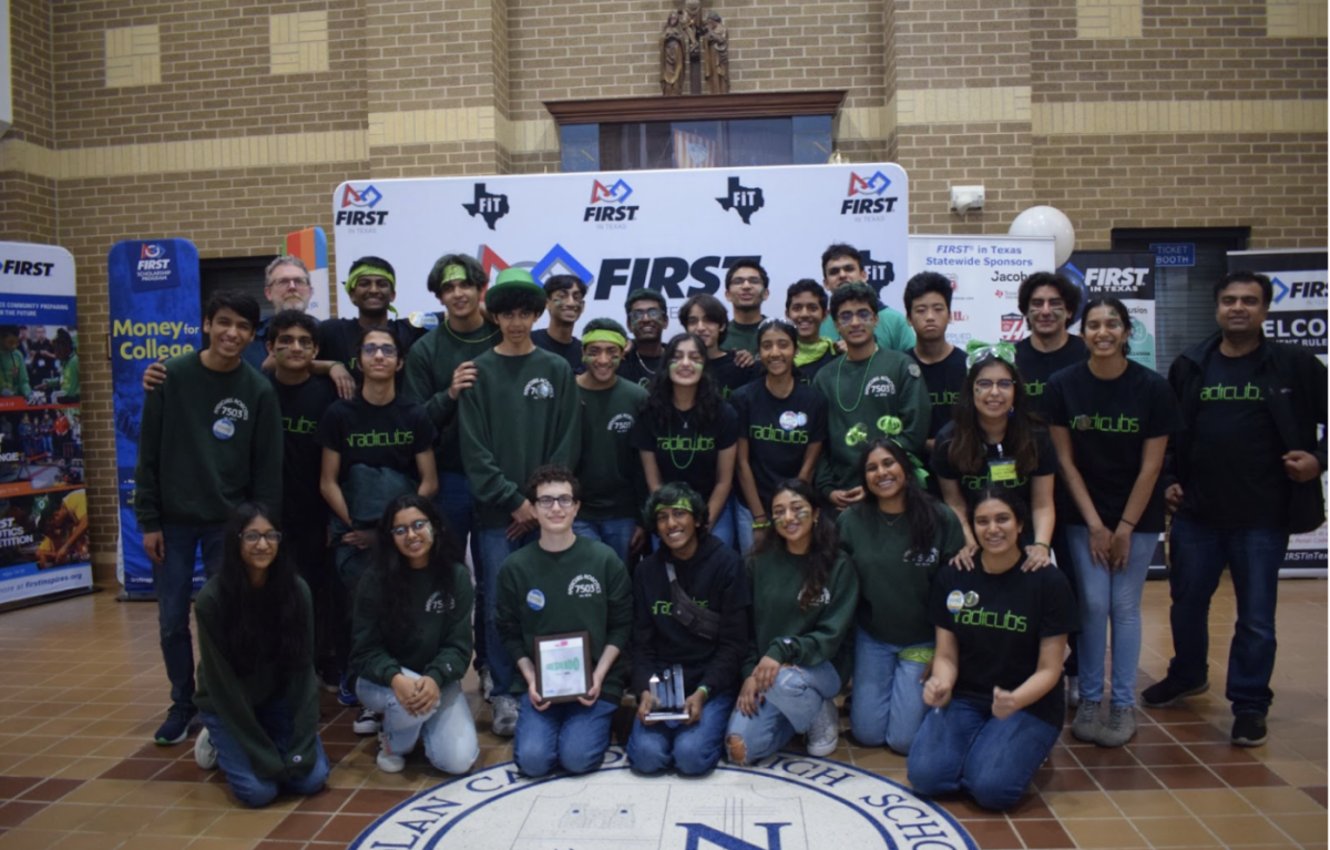 The Radicubs Robotics members posing for a photo. They participated in the FIRST Competition and won.